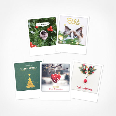 Das Pickmotion Heimelige Grüße 5er Postkarten-Set bietet festliche Karten mit Tiermotiven, Herzchen und Goldeffekten auf weißem Grund - ideal für Instagrammer*innen und zum Verschenken weihnachtlicher Grüße.