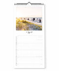 Der Pickmotion Küste & Meer - Familienplaner (Format 20x42) Wandkalender öffnet im Juni mit einer ruhigen Strandszene - ideal als Kalender 2024 oder Familienplaner und perfekt für Fans der Küstenfotografie.
